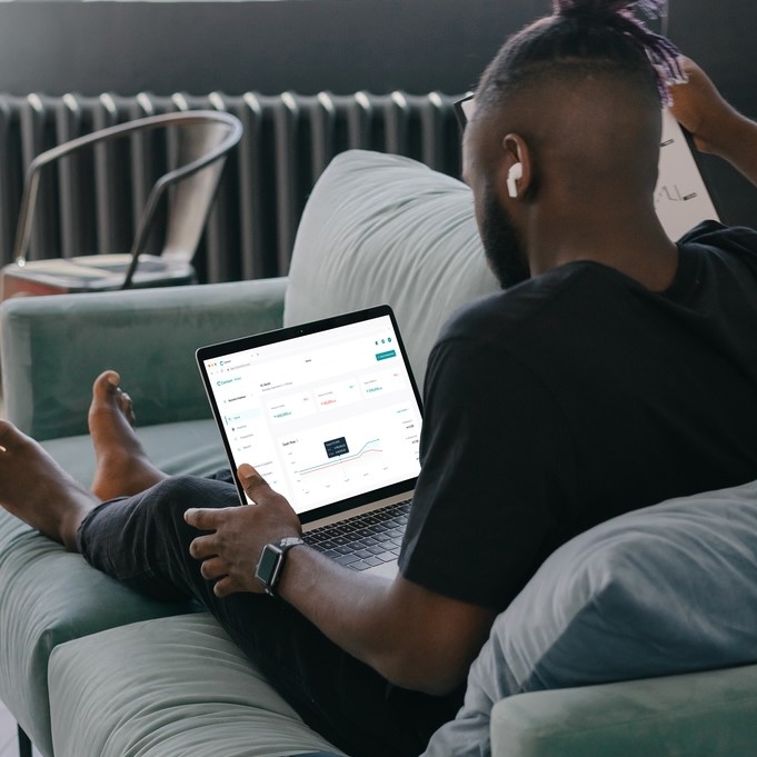 Business owner working on a laptop at home